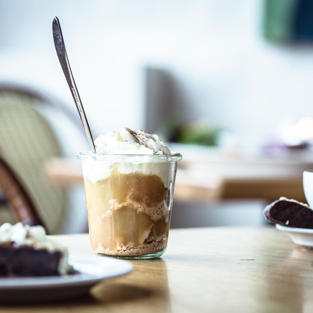 Homemade apple compote with whipped cream at Café Klint in Gudhjem.